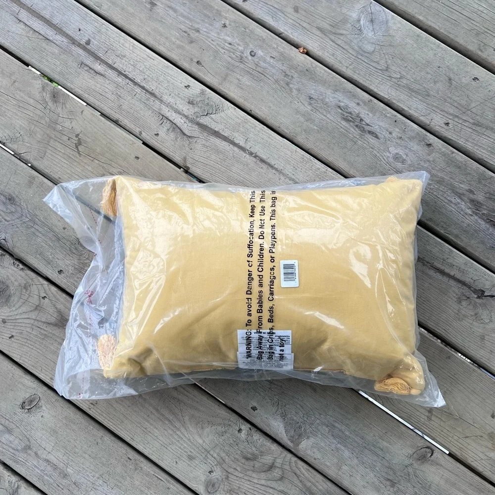 threshold embroidered bunny yellow pillow with tassels 14”x20”